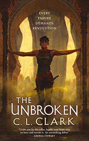 Book cover for THE UNBROKEN: title in white below a well-muscled figure pushes open doors against a yellow background