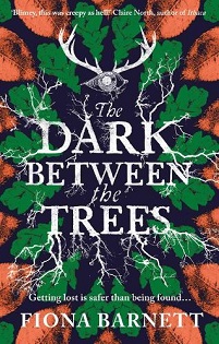 Book cover for THE DARK BETWEEN THE TREES: title in white on green, navy and orange leave below antlers with an eye