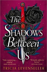 Book cover for THE SHADOWS BETWEEN US: title in white on graphic of a dagger and black roses on pink